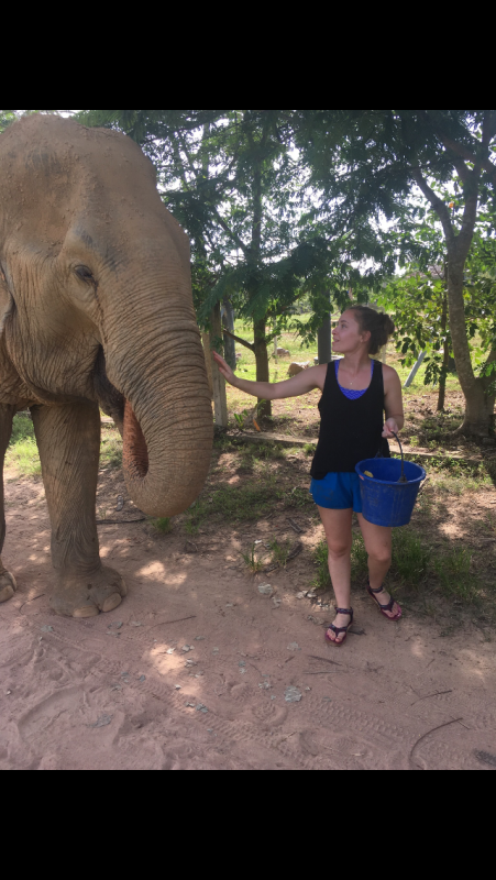 Alumni Blythe Owen with an elephant